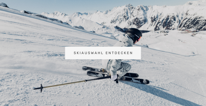 skifahrerin-faehrt-piste-herunter